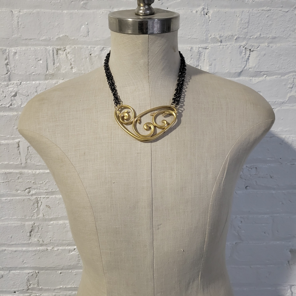 Elegant Gold and Black Heart Necklace